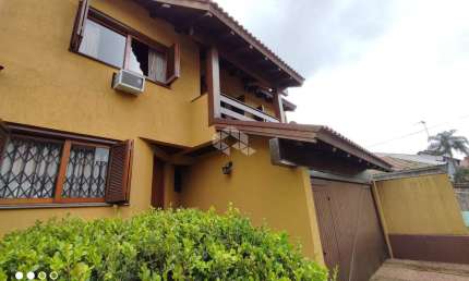 Casa com 4 quartos à venda na Rua Jorge Salis Goulart, 138, Jardim São Pedro, Porto Alegre