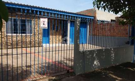 Terreno com 3 casas à venda no bairro Mathias Velho