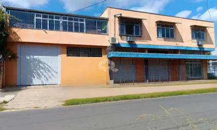 PRÉDIO COMERCIAL COM 3 LOJAS, 3 SALAS COMERCIAIS, DEPÓSITO E 3 VAGAS - SANTA MARIA GORETTI