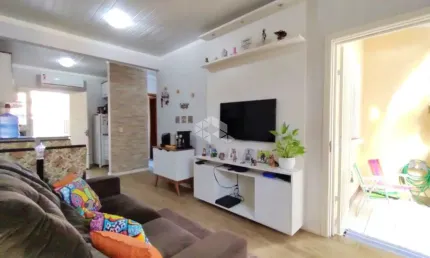 Excelente casa  semi mobiliada em condomínio,  02 dormitórios e 02 vagas cobertas com 65,28m² Privativos no bairro Olaria em Canoas.
