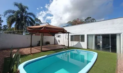 CASA EM CONDOMÍNIO COM 4 DORMITÓRIOS, 3 SUÍTES, 4 VAGAS, PISCINA - ÁGUAS CLARAS