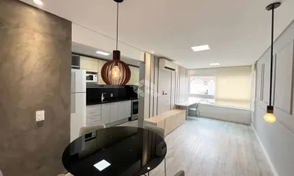 Apartamento mobiliado com 1 dormitório com suíte e vaga coberta  coberta -centro