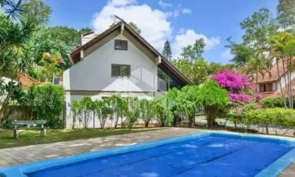 Casa sobrado no condomínio santa mônica em ipanema de 5 dormitórios.