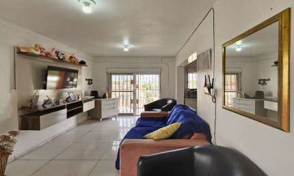 Casa/prédio à venda  com 4 apartamentos, vaga de garagem no Bairro Farrapos, Porto Alegre