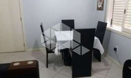 apartamento de 1 dormitório, com vaga, no bairro Higienópolis, semimobiliado, com split