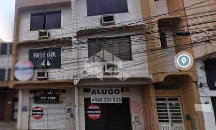 Prédio Comercial com 3 andares (8 salas e 2 lojas) perto da faculdade da SOGIPA