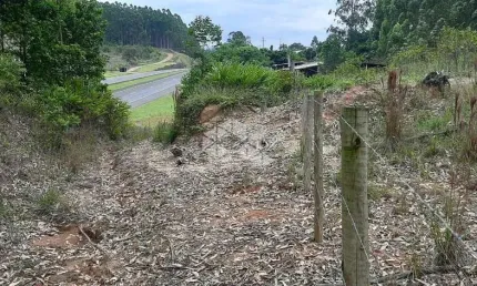 Uma área de terra na BR-386 próximo a Fábrica da Fruki