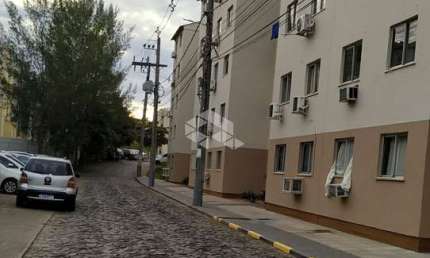 Apartamento 2 dormitórios com vaga de estacionamento Bairro Olaria Canoas RS