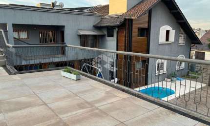 Sobrado 3 suítes, 600 m² construído, piscina aquecida, 2 vagas de garagens, Nossa senhora das Graças