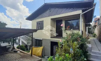 02 CASAS DE MADEIRA SOB 01 TERRENO DE 360M² NO SÃO CAETANO EM CAXIAS DO SUL