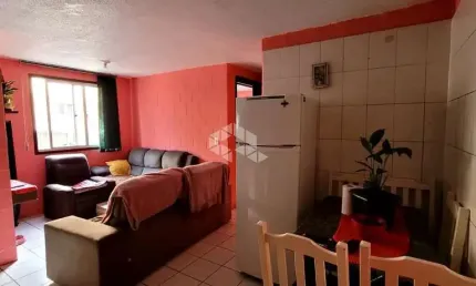 Apartamento terreio no cinquentenário, com dois quartos.