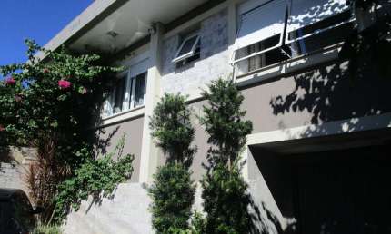 Casa de 4 dormitórios e garagem no Bairro Glória em Porto Alegre/RS
