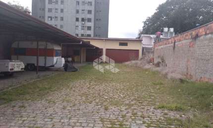 Terreno, estacionamento, oficina mecânica à venda no bairro Partenon - Porto Alegre/RS