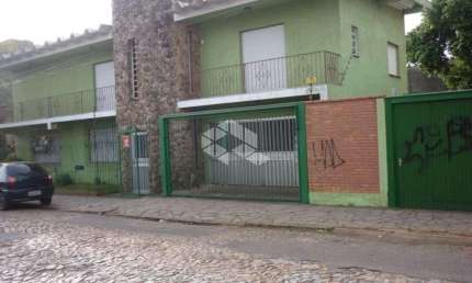 Casa/sobrado com 2 aptos, térreo 2 dormitórios superior 3 dormitórios no bairro Sarandi