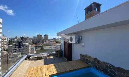 Cobertura com 3 dormitórios e 1 suíte de 226,63m² privativos no bairro Menino Deus