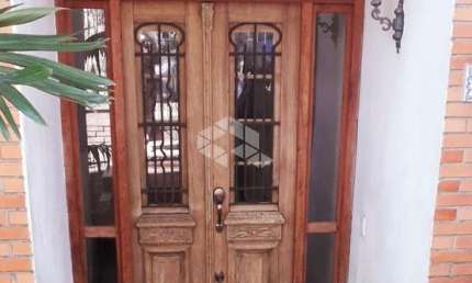 Casa com 4 quartos à venda na Rua Itapitocaí, 128, Cristal, Porto Alegre