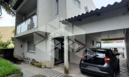 Casa com 210m² 3 dorm. e 3 vagas no bairro Costa e Silva em Porto Alegre