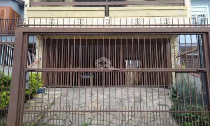 Casa à Venda com 03 dormitórios, 02 vagas de garagem no Bairro Passo D'Areia - Porto Alegre / RS