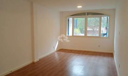 Apartamento JK / Kitnet à venda com pátio no bairro Auxiliadora - Porto Alegre/RS