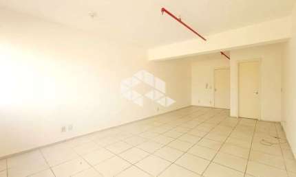 Sala - conjunto comercial com vaga de garagem à venda no bairro Partenon em Porto Alegre.