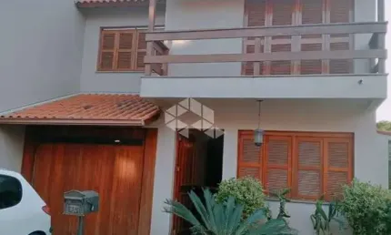 Casa em condomínio fechado com 4 quartos à venda na Avenida Orleaes, 105, Guarujá, Porto Alegre