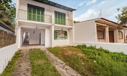 Venda de casa de 2 quartos e garagem no bairro gloria em porto alegre - rs.