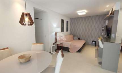 Apartamento garden semimobiliado com 3 dormitórios, sendo 1 suíte, 2 vagas de garagem + hobby box no bairro Monte Verde em Florianópolis/SC.