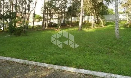 Terreno em condomínio fechado no bairro Ratones, com 450,95m².