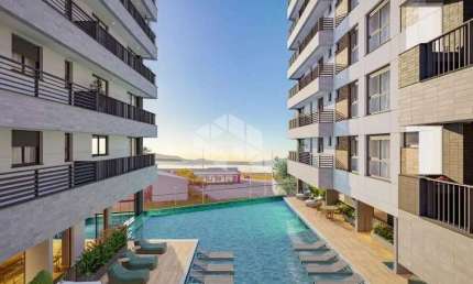APARTAMENTO COM 3 QUARTOS SENDO 1 SUÍTE E 2 DEMI-SUÍTES 2 VAGAS DE GARAGEM NO BAIRRO PRAIA COMPRIDA EM SÃO JOSÉ/SC