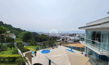CASA EM CONDOMINIO DE LUXO COM 4 QUARTOS SENDO 2 SUÍTES 2 VAGAS DE GARAGEM NO BOSQUE DAS MANSÕES EM SÃO JOSÉ/SC