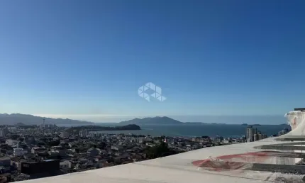 Apartamento em construção com 2 quartos sendo 1 suíte no bairro nossa senhora do rosário em são josé/sc