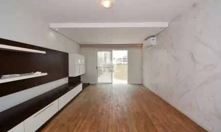 APARTAMENTO SEMIMOBILIADO COM 3 QUARTOS SENDO 2 SUÍTES E 2 VAGAS DE GARAGEM NO CÓRREGO GRANDE EM FLORIANÓPOLIS/SC