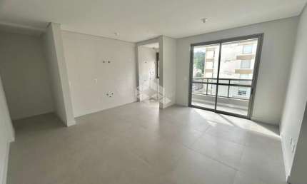 APARTAMENTO MODERNO DE 3 QUARTOS SENDO 1 SUÍTE COM 1 VAGA DE GARAGEM E VISTA PANORÂMICA NA CARVOEIRA FLORIANÓPOLIS