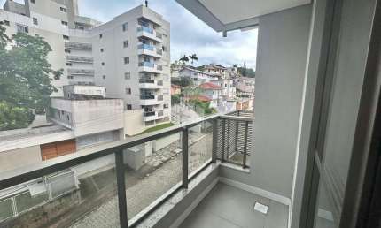 APARTAMENTO MODERNO DE 3 QUARTOS SENDO 1 SUÍTE COM 1 VAGA DE GARAGEM E VISTA PANORÂMICA NA CARVOEIRA FLORIANÓPOLIS