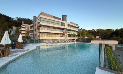 Apartamento com 3 suítes e 2 vagas de garagem em cacupé florianópolis/sc