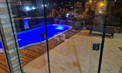 CASA DE ALTO PADRÃO COM VISTA PARA O MAR COM 3 QUARTOS SENDO 1 SUÍTE E 3 VAGAS DE GARAGEM NO SACO DOS LIMÕES EM FLORIANÓPOLIS/SC