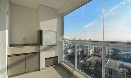 APARTAMENTO COM VISTA PARA O MAR E ÁREA DE LAZER COMPLETA NO ESTREITO FLORIANÓPOLIS