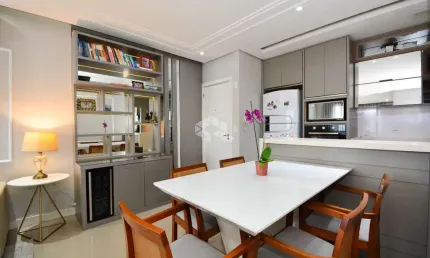 APARTAMENTO COM 2 QUARTOS SENDO 1 SUÍTE SEMIMOBILIADO SACADA COM CHURRASQUEIRA E VISTA PARCIAL DO MAR EM BARREIROS SÃO JOSÉ