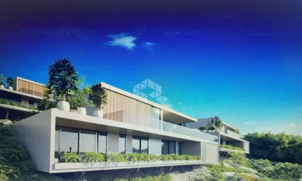 Casa com 4 suítes, 4 vagas e 647,20 m² de área construída, na Vigia com vista eterna para a baía de Garopaba