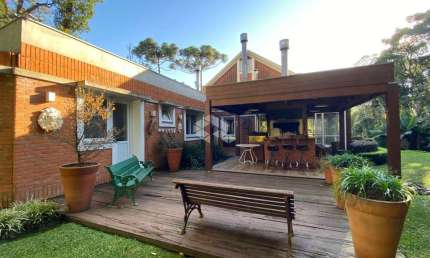 Casa 4 dormitórios com 440,16m² privativos no Condomínio Golf Club em Gramado