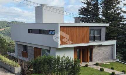 Casa 4 suítes, 491m² privativos, no Condomínio Aspen Mountain, em Gramado