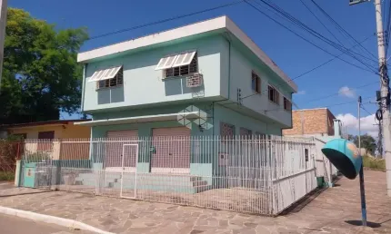 Casa à venda com 3 dormitórios , 1 vaga garagem, com amplo salão no térreo para uso comercial