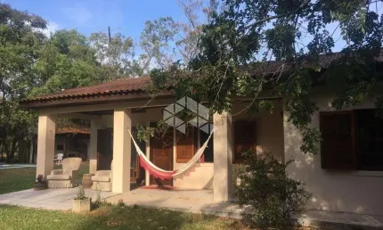 Sítio no guaíba country clube - com casa, piscina e muita área arborizada - parque eldorado