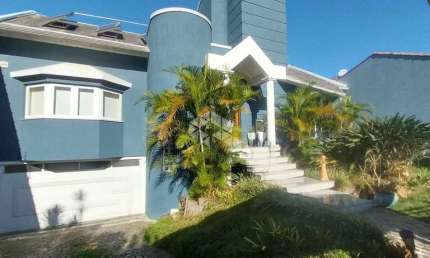 Casa à venda com 3 quartos, 2 vagas no centro de Guaíba com vista panorâmica para o Guaíba