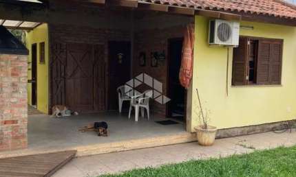 Casa à venda com 4 quartos e 3 vagas no bairro Residencial de Eldorado do Sul