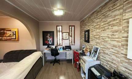 Casa com 3 dormitórios e 2 vagas na Rua República Canoas