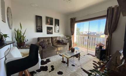 Seu Novo Lar em Canoas: Apartamento com 3 Dormitórios, Sacada e Móveis Planejados