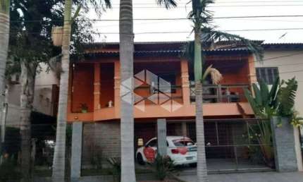 Sobrado com 3 dormitórios sendo 1 suíte no bairro Nossa senhora das graças