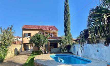 Casa com 5 quartos à venda na Rua Buttenbender, 835, Fátima, Canoas