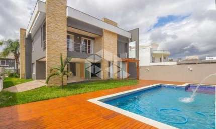 Casa Sobrado com 4 Dorm. Sendo 3 Suites com Piscina no Moinhos de Vento.